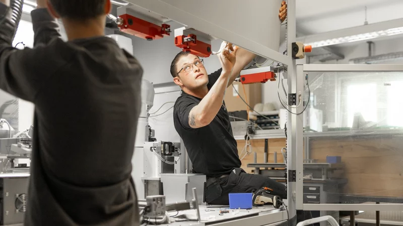Employees mixing a cradle-to-cradle system